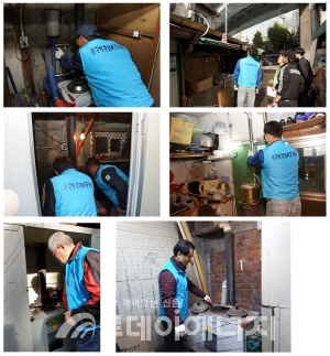 한국열관리시공협회 회원이 영등포 쪽방촌에서 난방설비를 점검하고 있다.